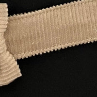 Attache tétine tissu noeud