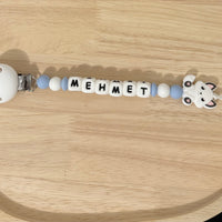 Attache tétine Mehmet