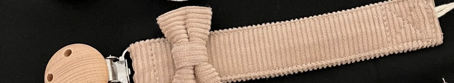 Attache tétine tissu noeud
