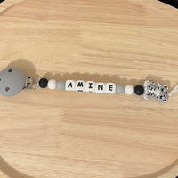 Attache tétine Amine